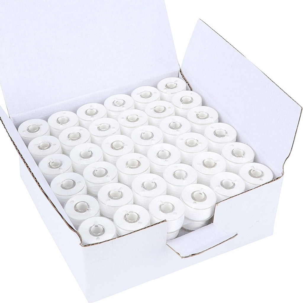 New brothread prewound bobbins, white thread spools in open tray box