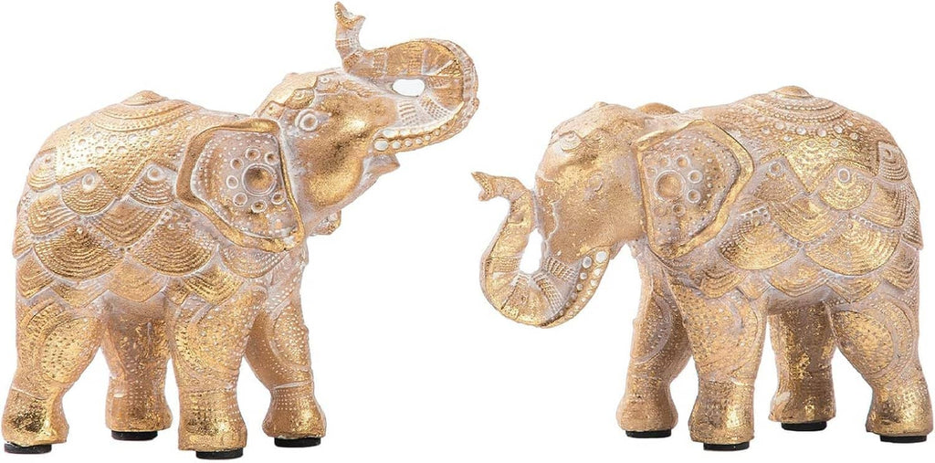 Gold elephant figurine pair with raised trunks, decorative engraved texture.
