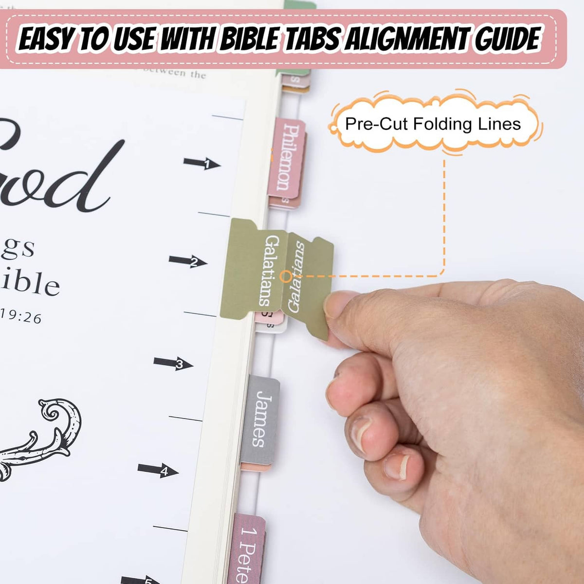 Hand applying laminated Bible tabs with alignment guide for straight placement