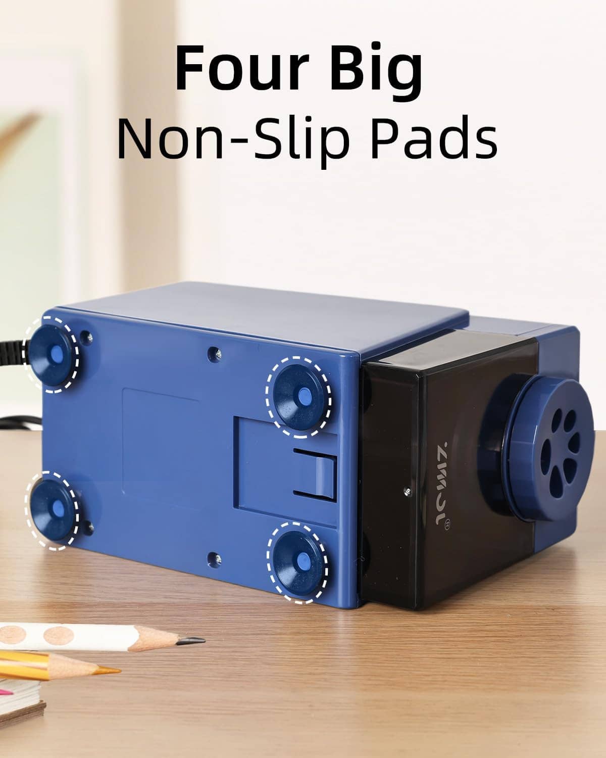 Blue electric pencil sharpener with four non-slip pads and side control dial