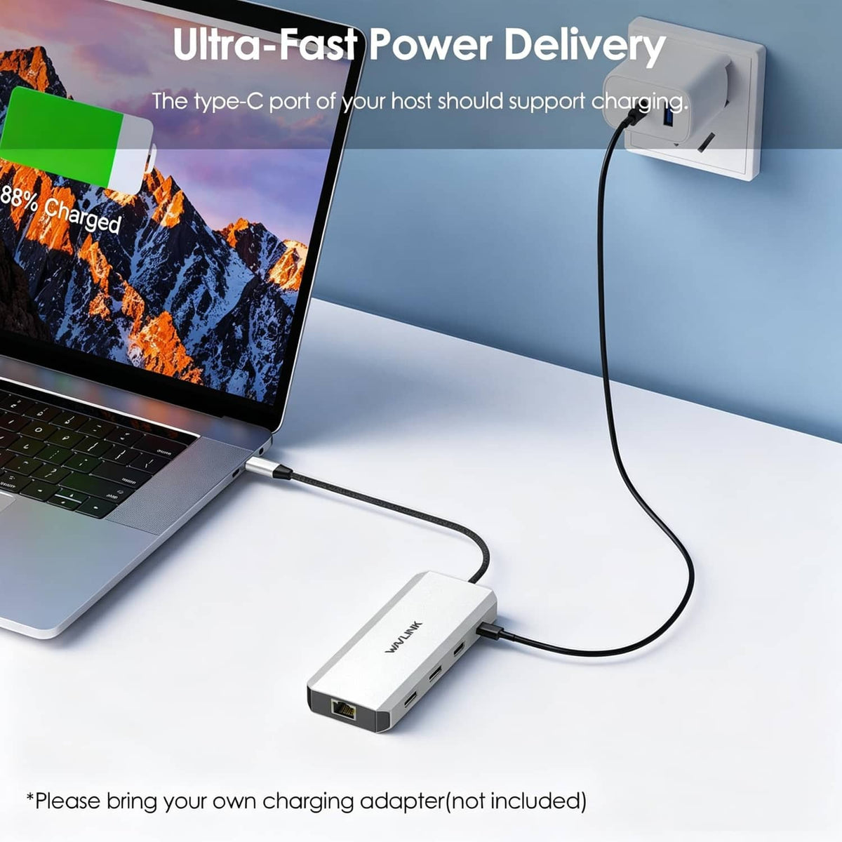 Laptop connected to a silver docking station with USB-C power delivery