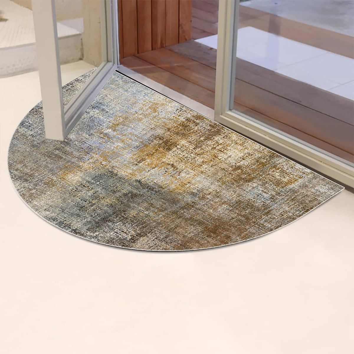 Semicircular textured doormat in blue-gray and tan, flat low-profile weave