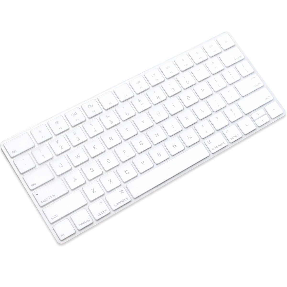 Transparent silicone keyboard cover covering keys and trackpad area