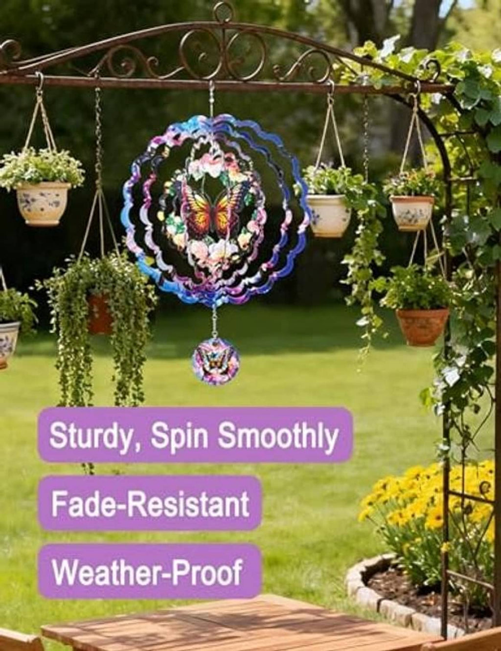 Purple butterfly wind spinner with hanging round pendant and multi-layer metal blades