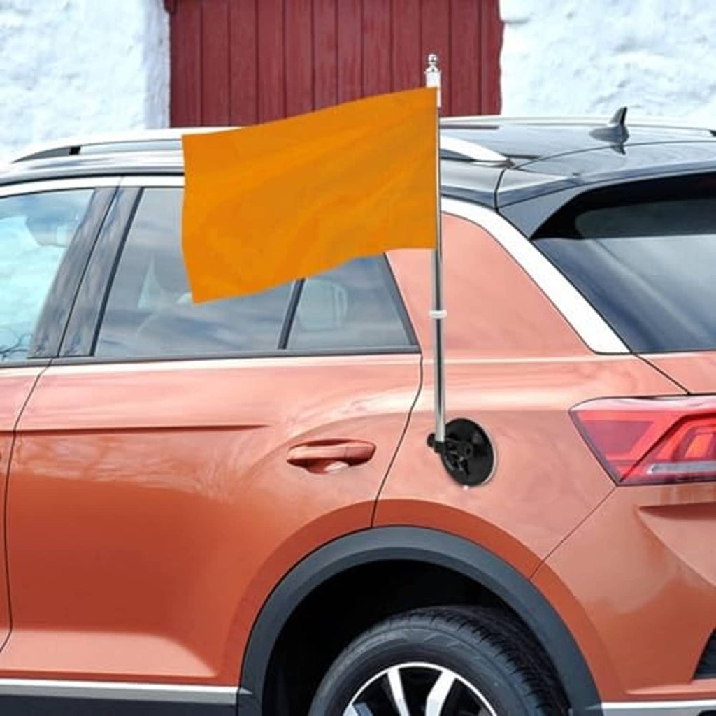 Car flagpole suction mount with orange flag on rear-side door panel