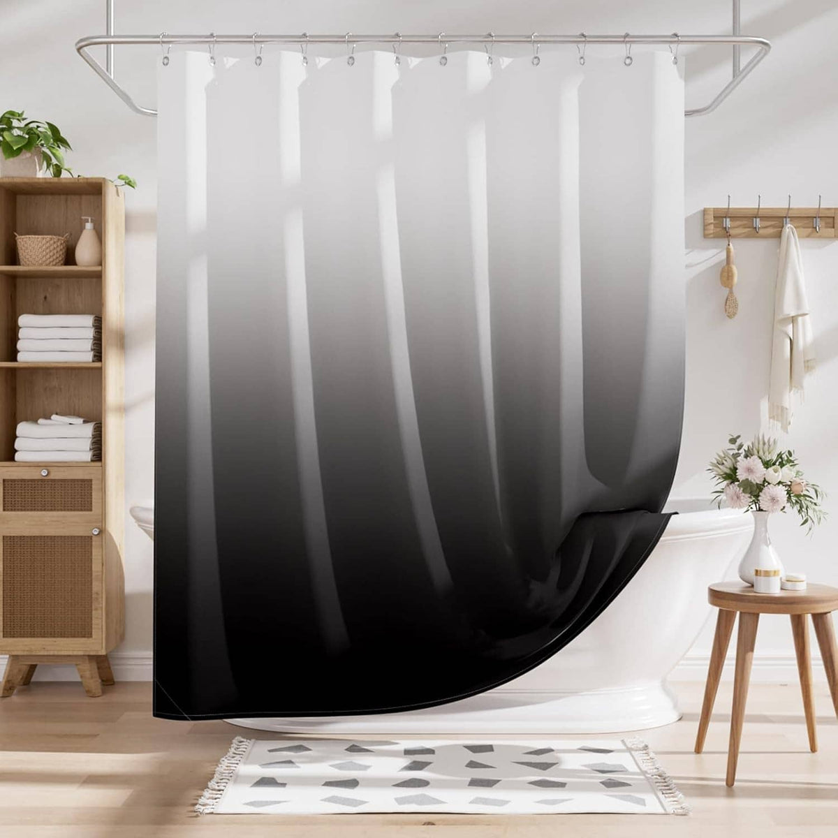 Cloth ombre shower curtain with black bottom curve and white upper gradient; hooked top