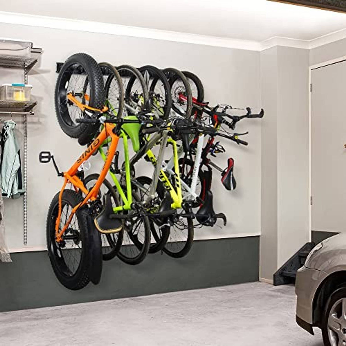 Wall bike storage rack holding colorful bicycles in a garage or room