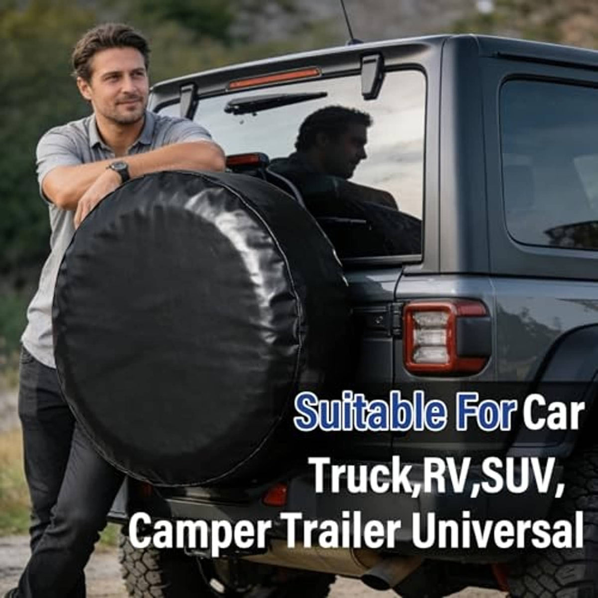Black spare tire cover on a spare wheel, round protective cover on truck