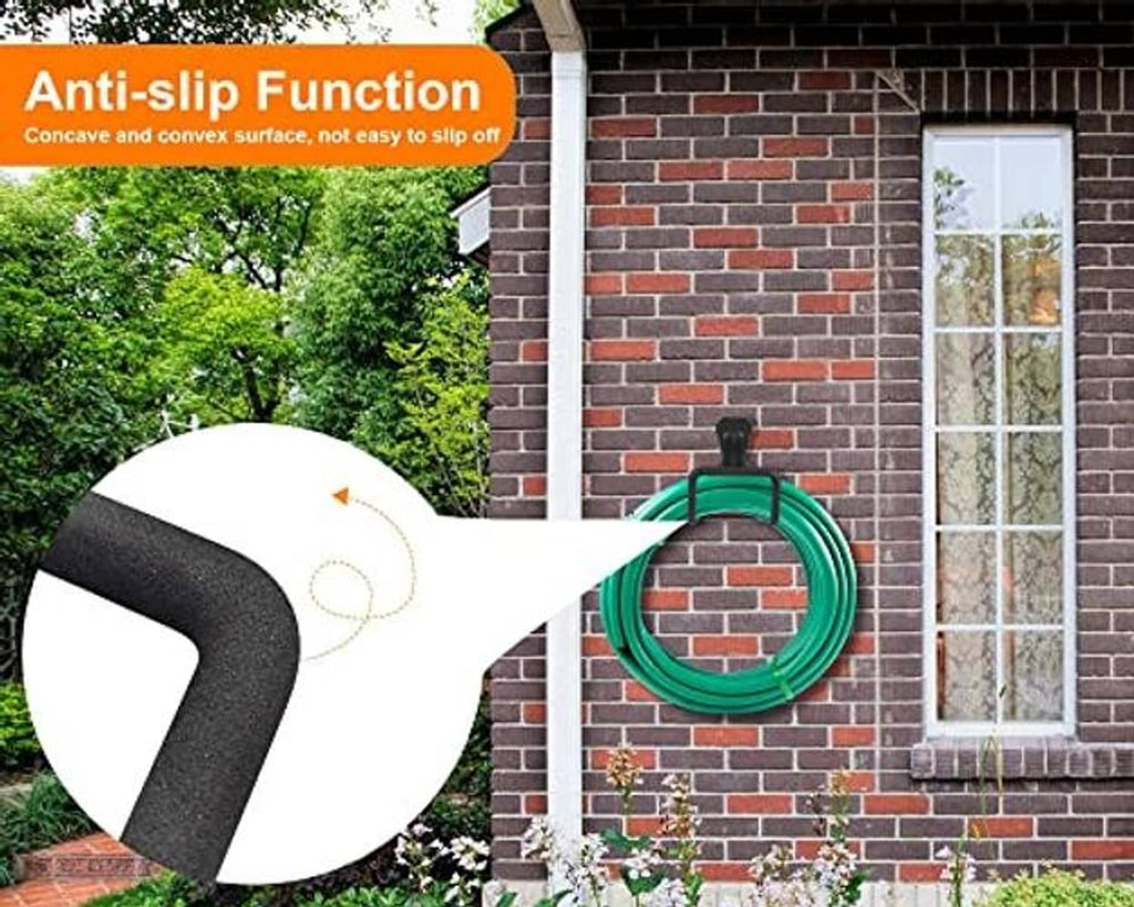 Black metal wall-mounted hose hanger holding a green garden hose loop