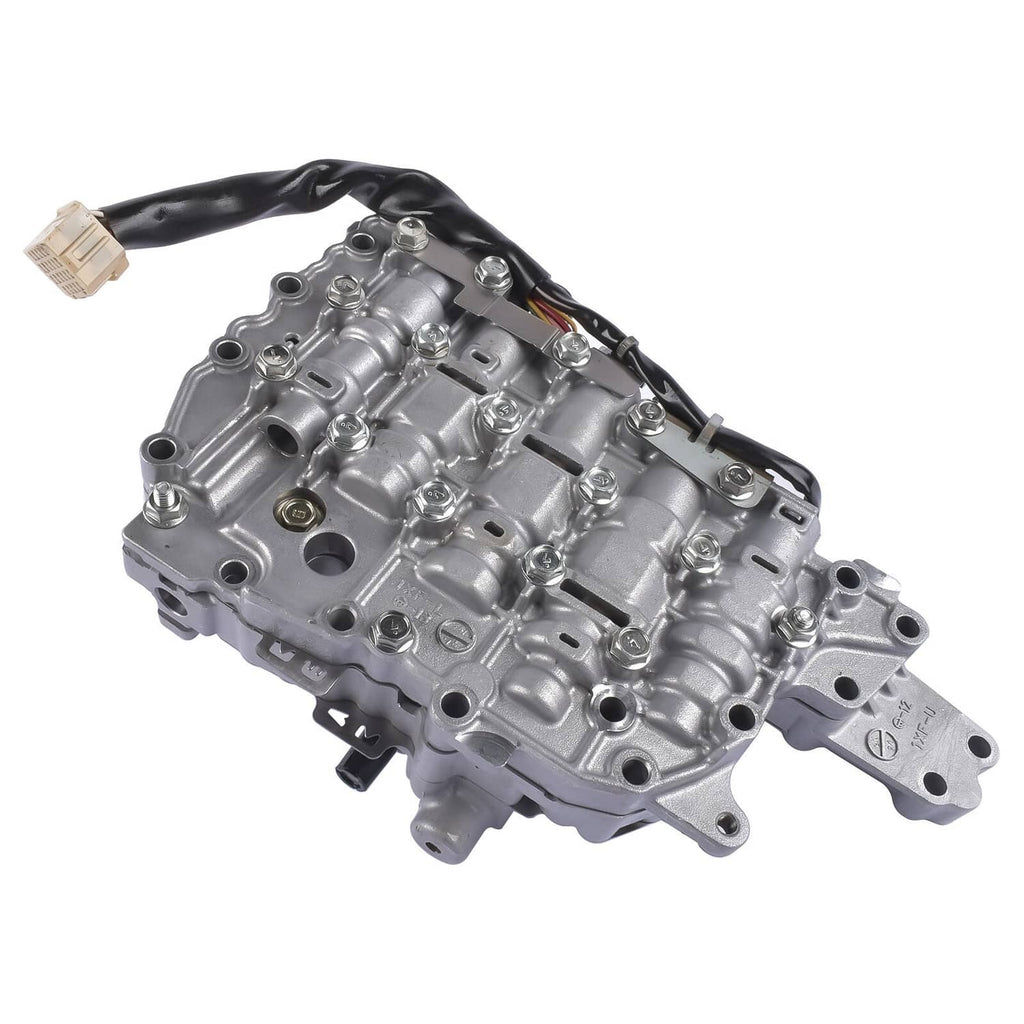 Automatic transmission valve body with metal housing and wiring loom