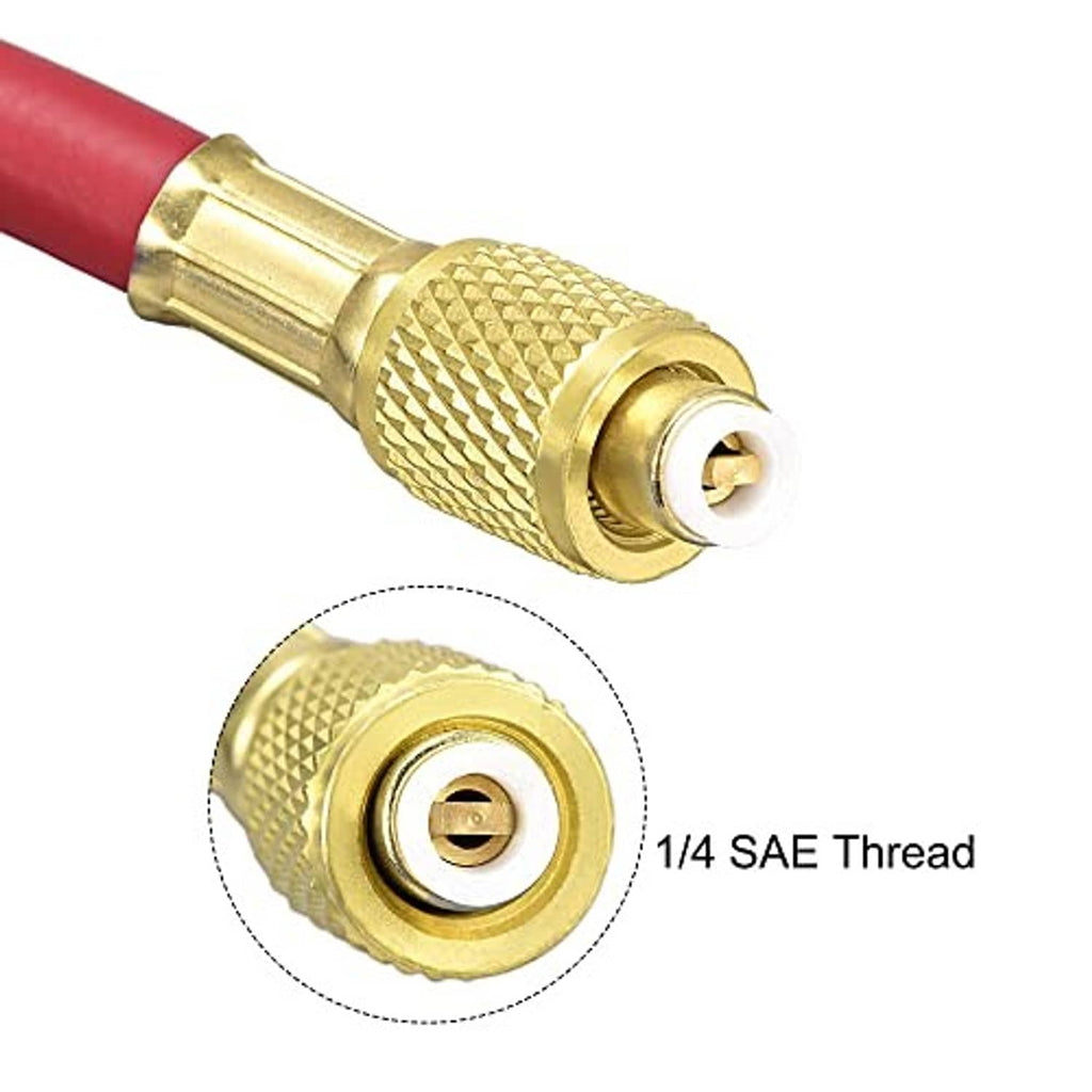 Brass 1/4 SAE flare thread connector on red refrigerant charging hose end, close-up