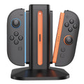 Quad Joy-Con charging station with LED indicator, black dock and orange/blue charging rails