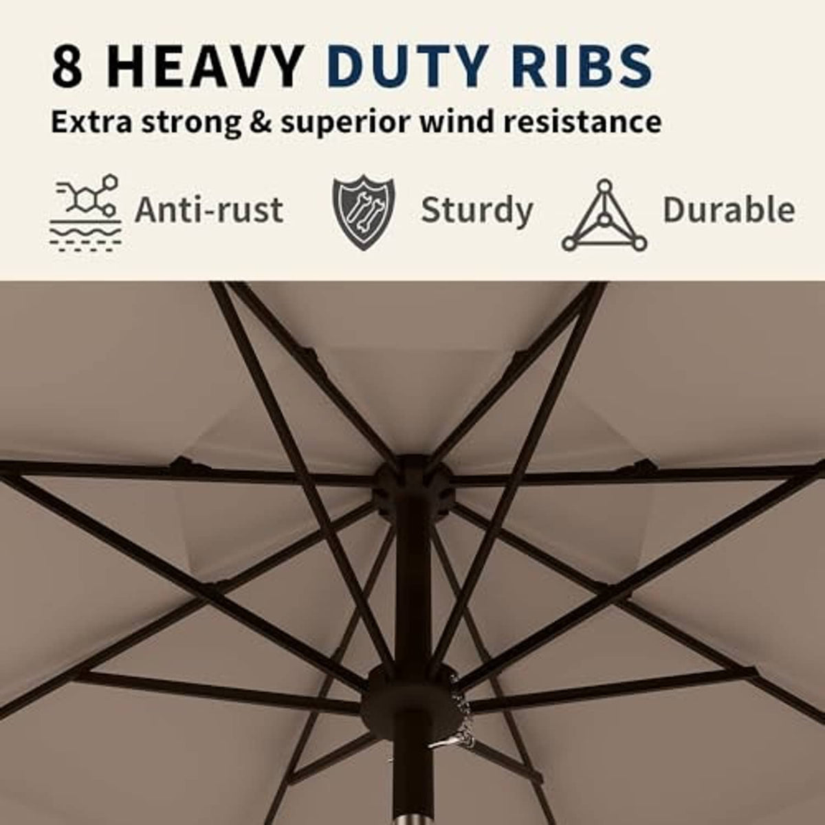 Beige 3-tier umbrella underside with black heavy-duty ribs and center pole