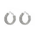 Silver-toned small hoop earrings with sparkling faceted stones, hinged back