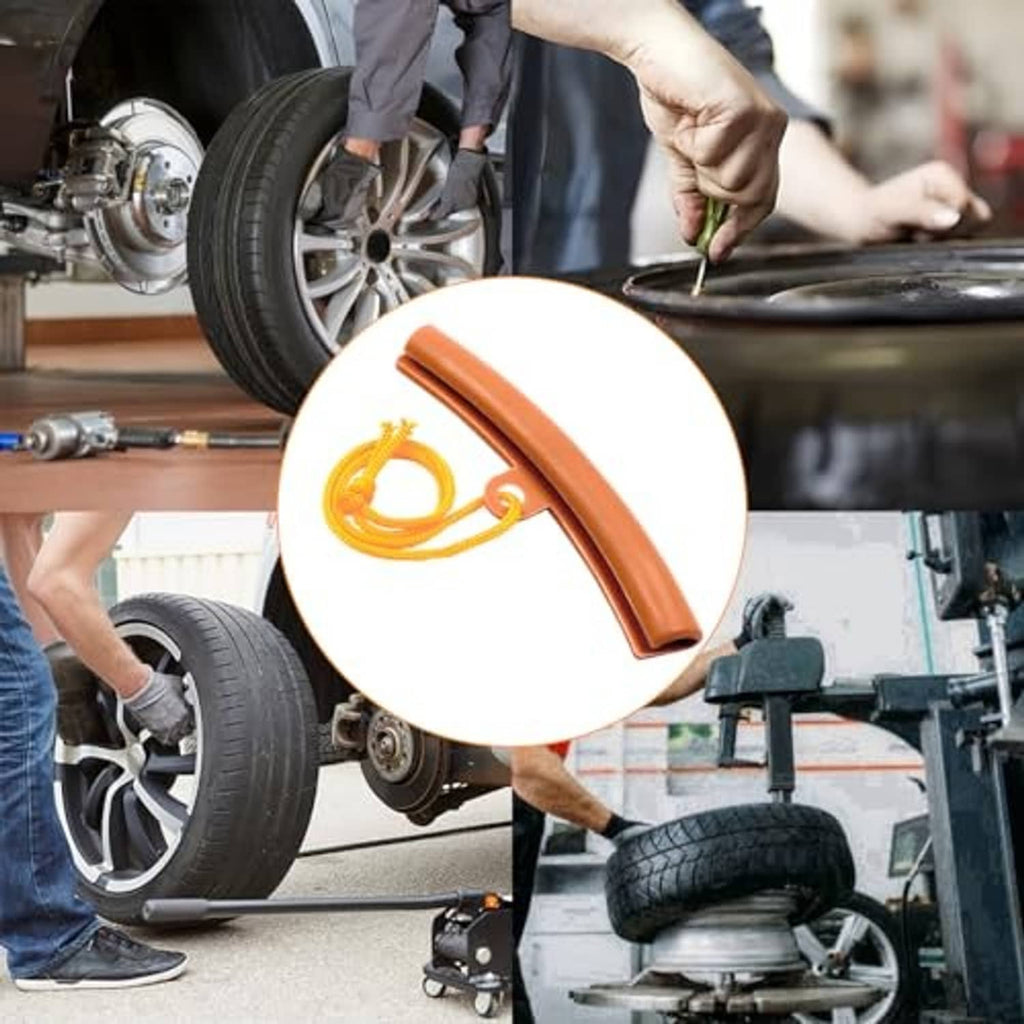 Orange curved rim protector strip with yellow cord held near an installed wheel.