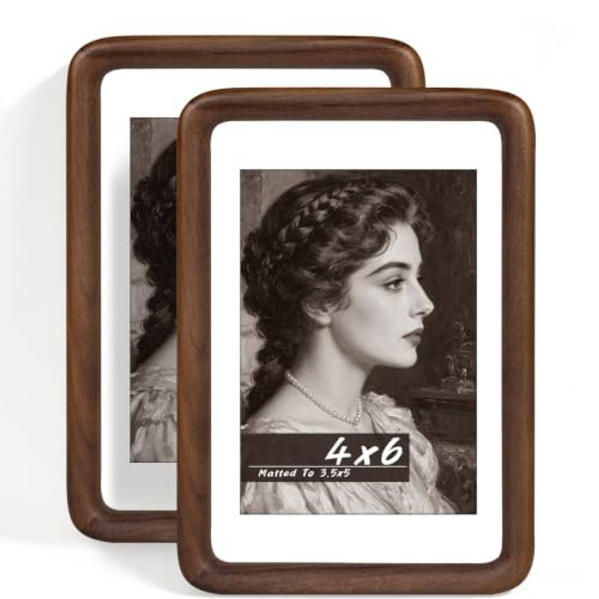 Set of two walnut wood photo frames with white mat, featuring black-and-white portrait photos