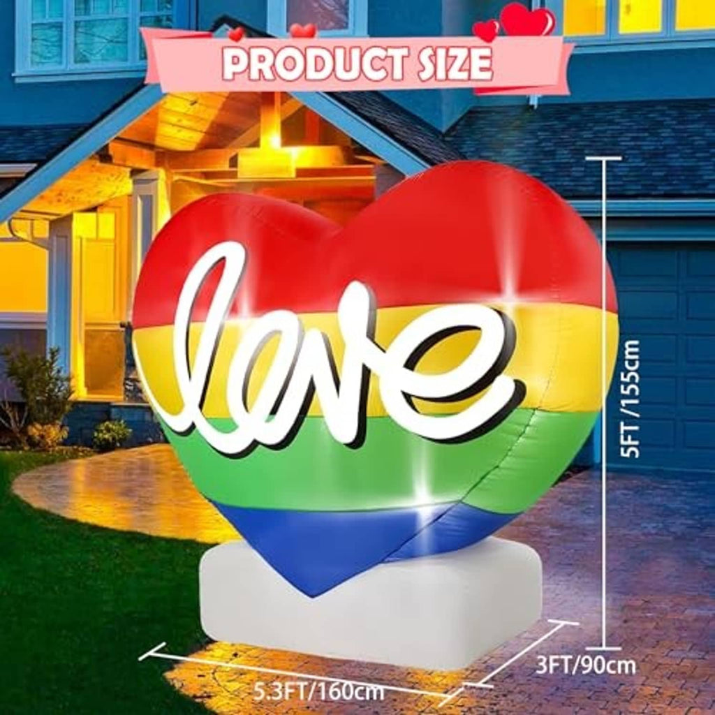 Inflatable Pride rainbow heart with 'Love' script, mounted on white pedestal