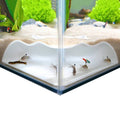 White corner aquarium cave insert with scalloped top opening for fish viewing