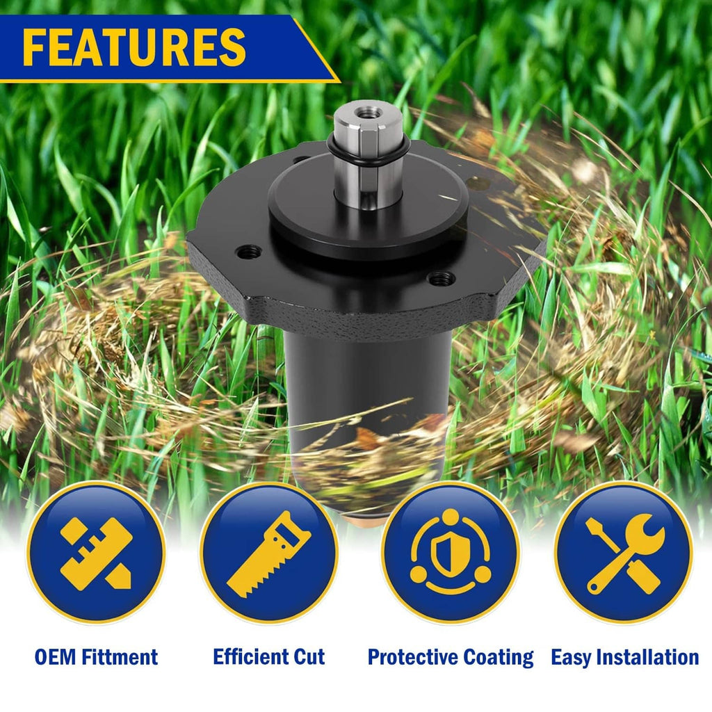 Black deck spindle assembly with steel shaft on textured grass background