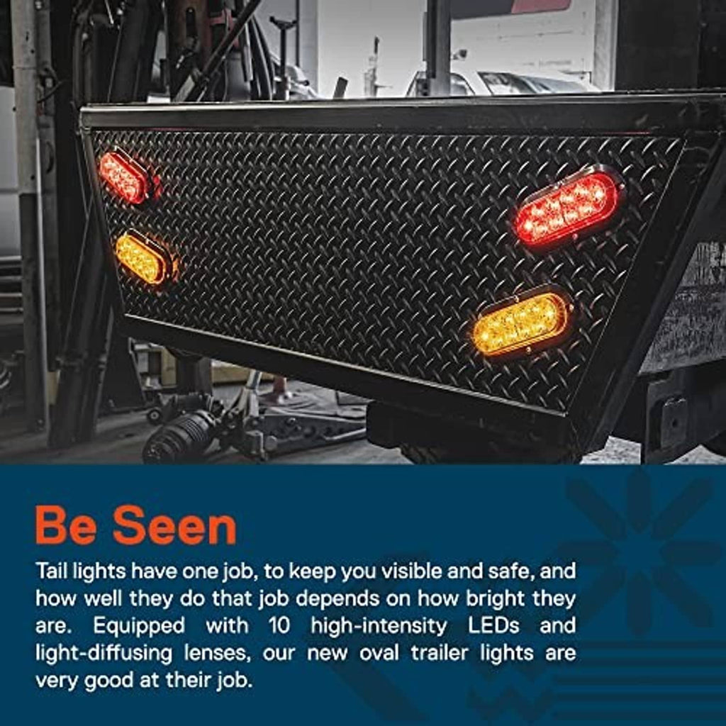 Pair of oval trailer lights with red and amber LED lenses on black diamond plate