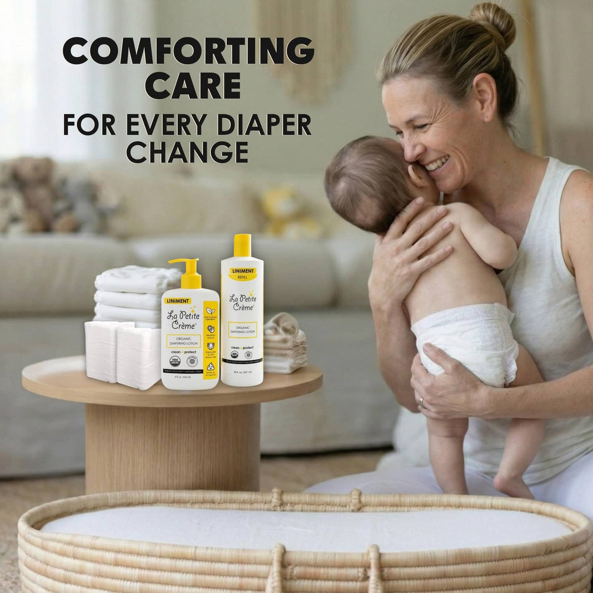 La Petite Creme French diapering lotion bottles on display, white with yellow pumps