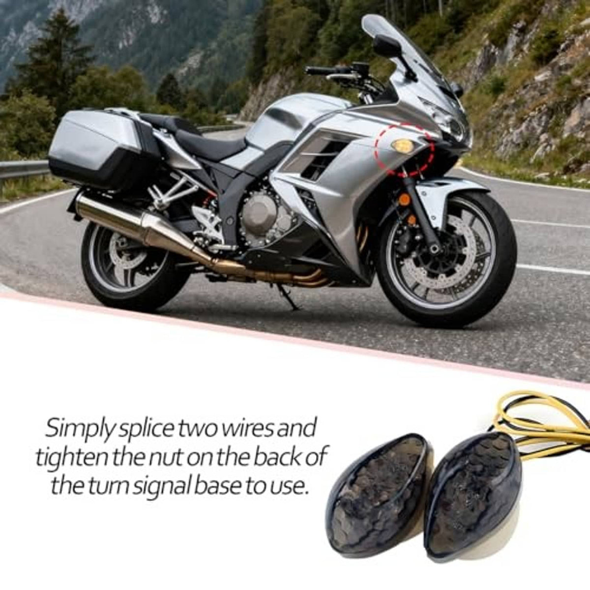 Motorcycle-mounted amber LED turn signals with black oval lenses and wiring