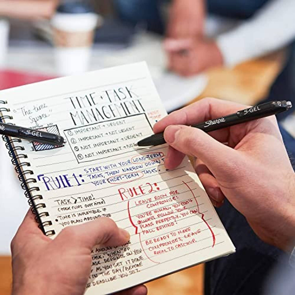 Sharpie S-GEL gel pen in hand writing on lined planner, medium 0.7mm tip