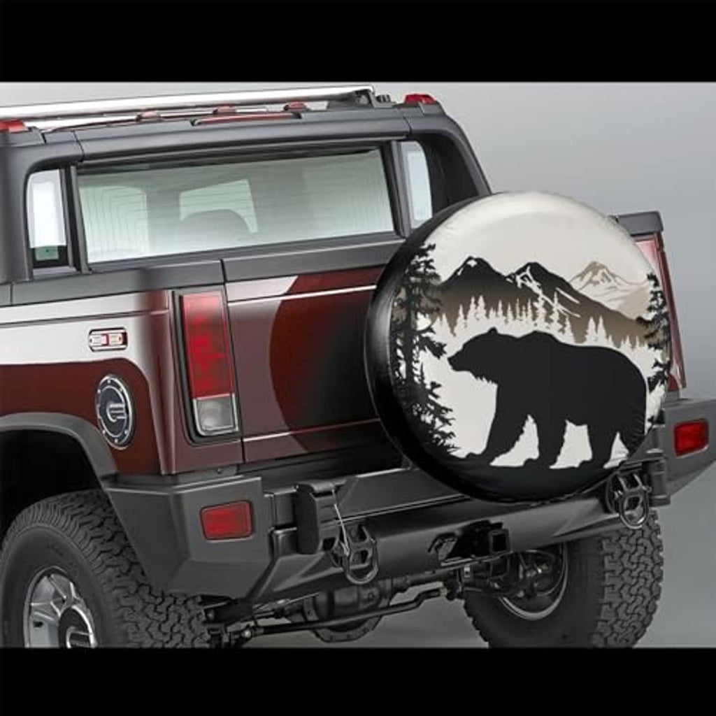 Round bear mountain tire cover on a vehicle spare tire at the back