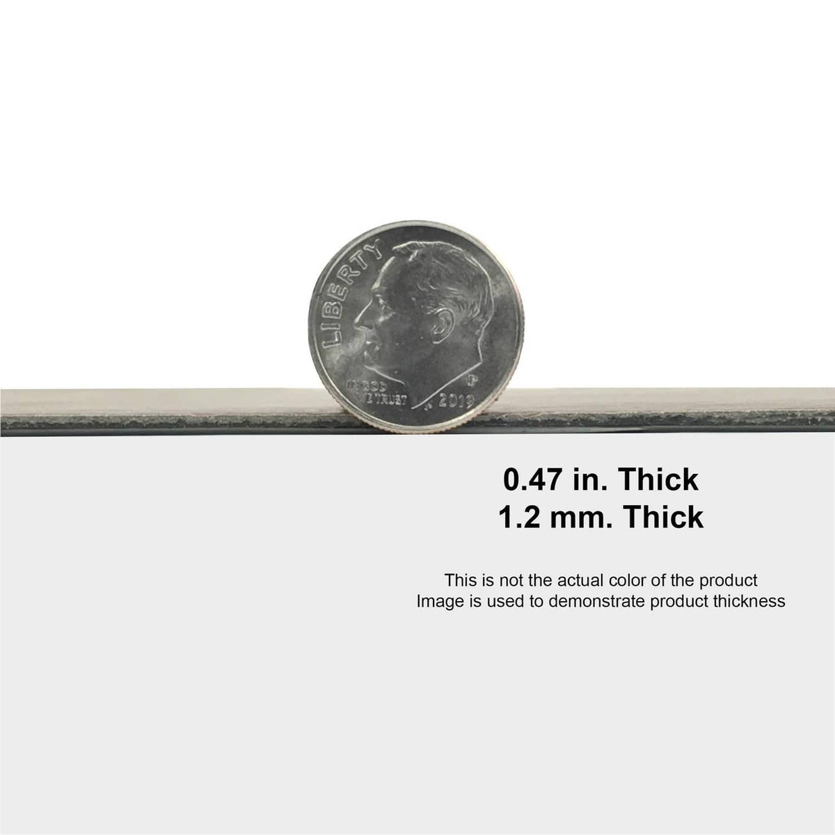 Vinyl floor tile thickness shown with coin scale on edge, about 1.2 mm