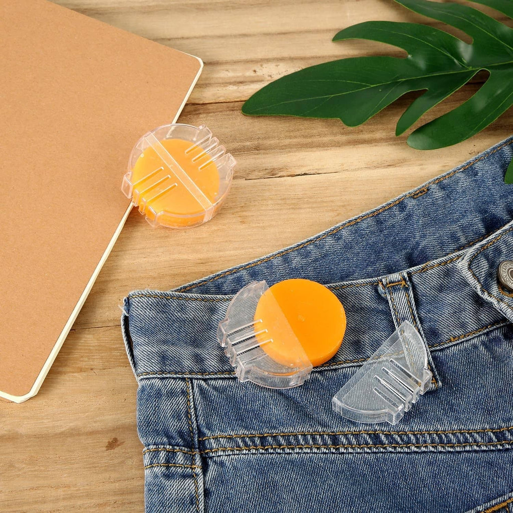 Orange beeswax thread conditioner disc with clear holder for sewing