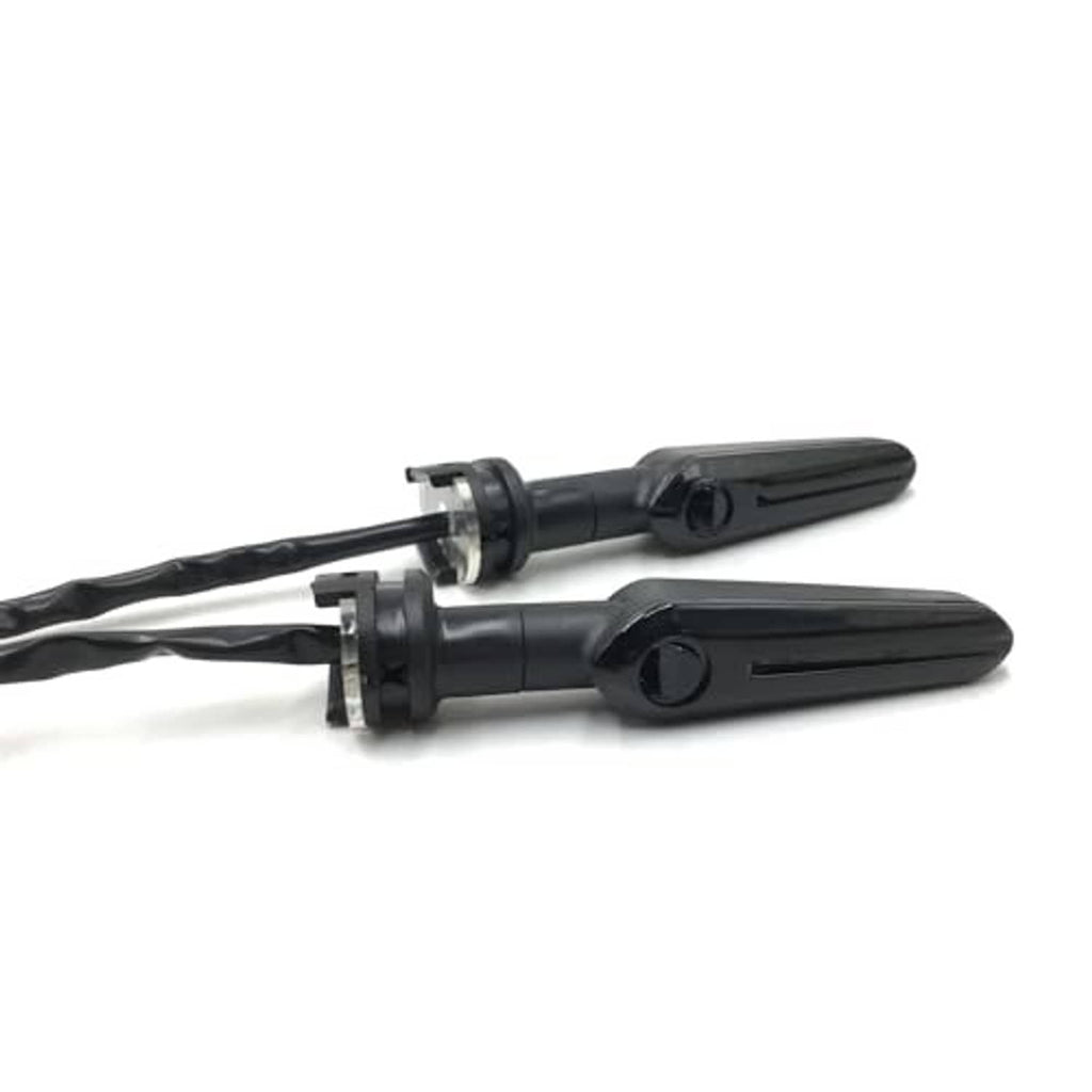 Smoked black motorcycle LED turn signal arrow lights with attached wiring