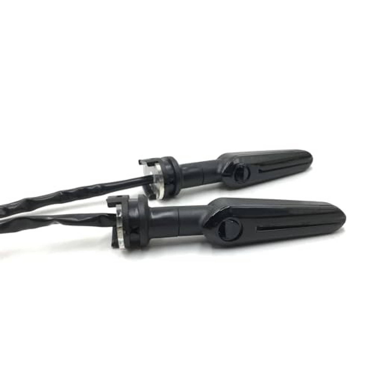 Smoked black motorcycle LED turn signal arrow lights with attached wiring
