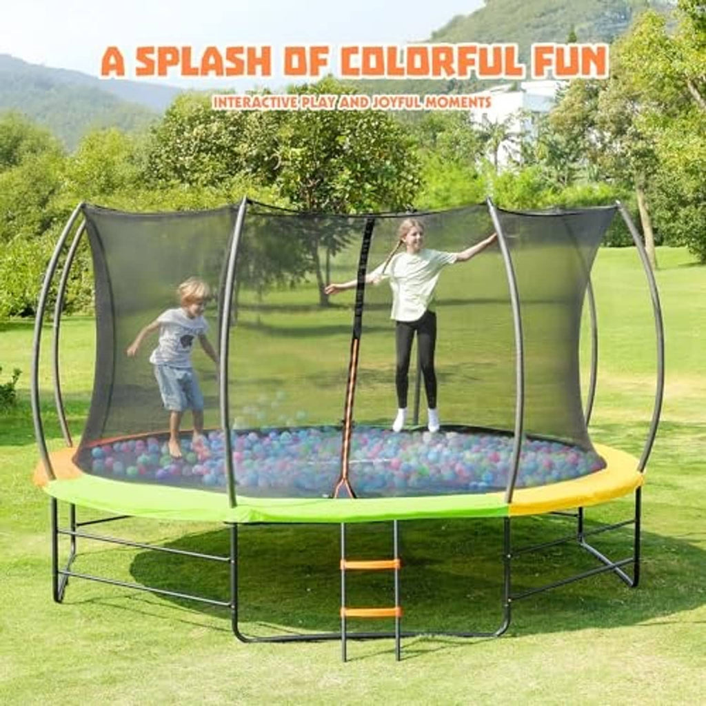 Outdoor trampoline with safety net enclosure and green padded base, kids playing on mat