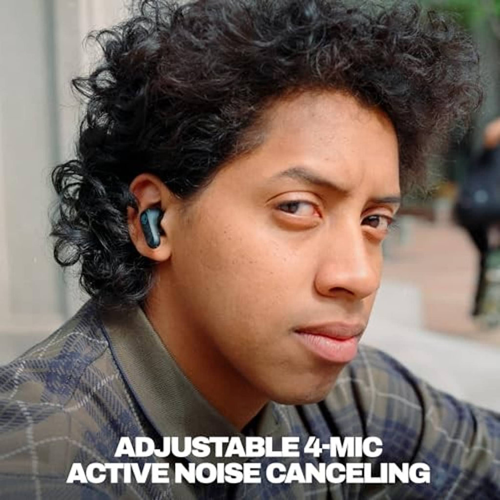 Woman wearing black wireless earbuds in one ear