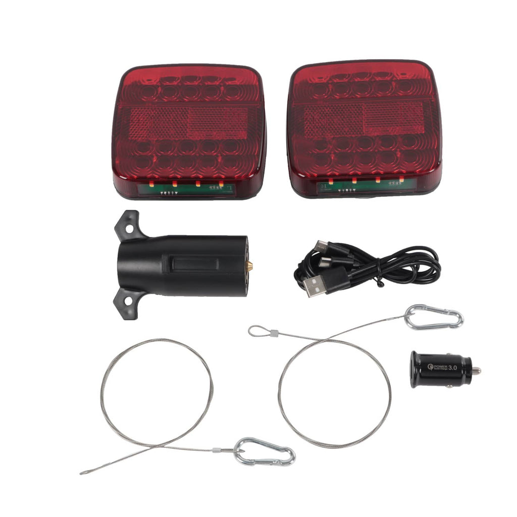 Pair of red square LED tail lights with black brackets, wire loops, and charging cable