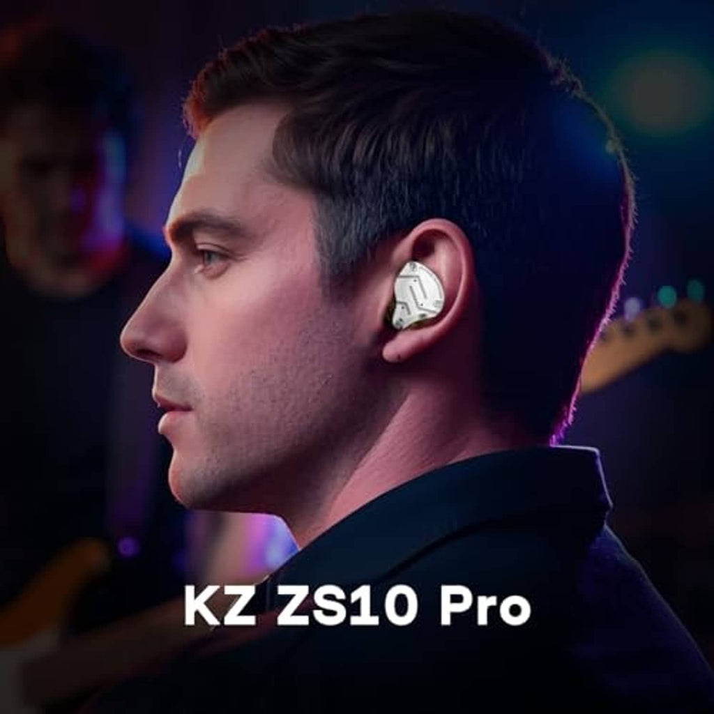 In-ear monitor worn in ear with silver faceplate and clear body