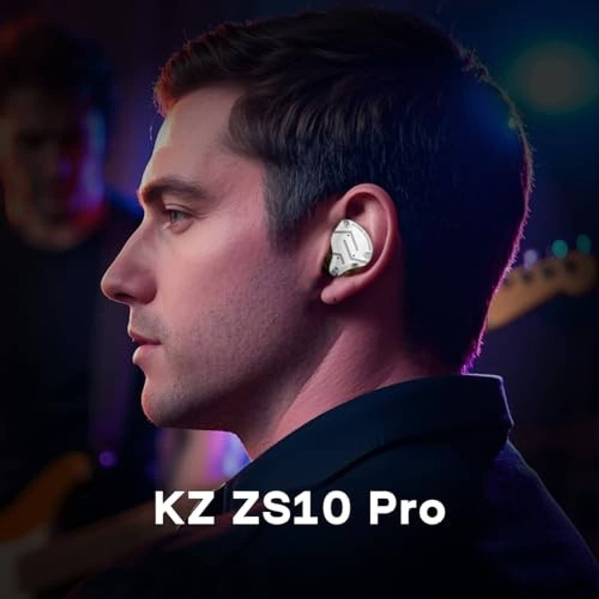 In-ear monitor worn in ear with silver faceplate and clear body