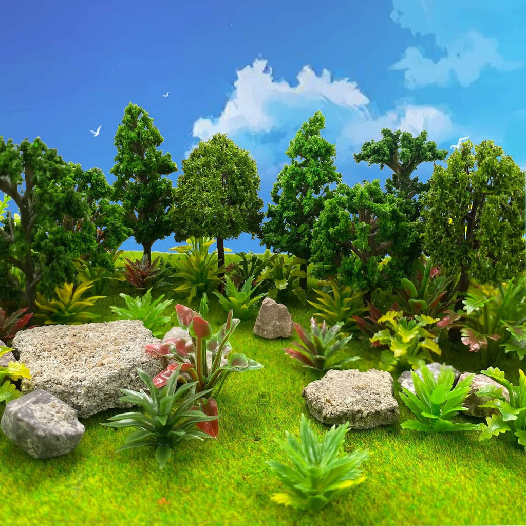 Assorted green model trees and miniature plants with small rocky accents