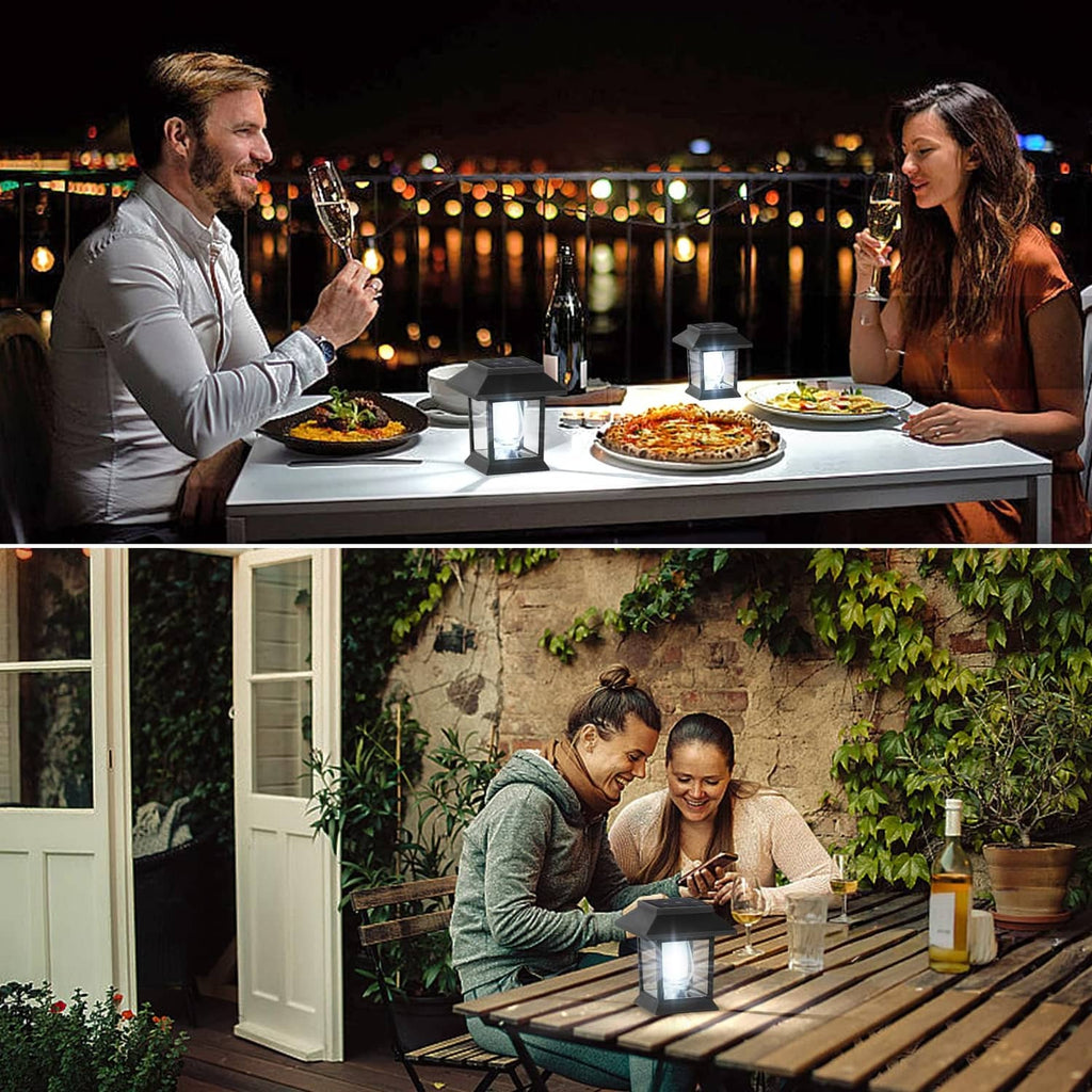Solar lantern light on patio table, black lantern housing glowing cool white