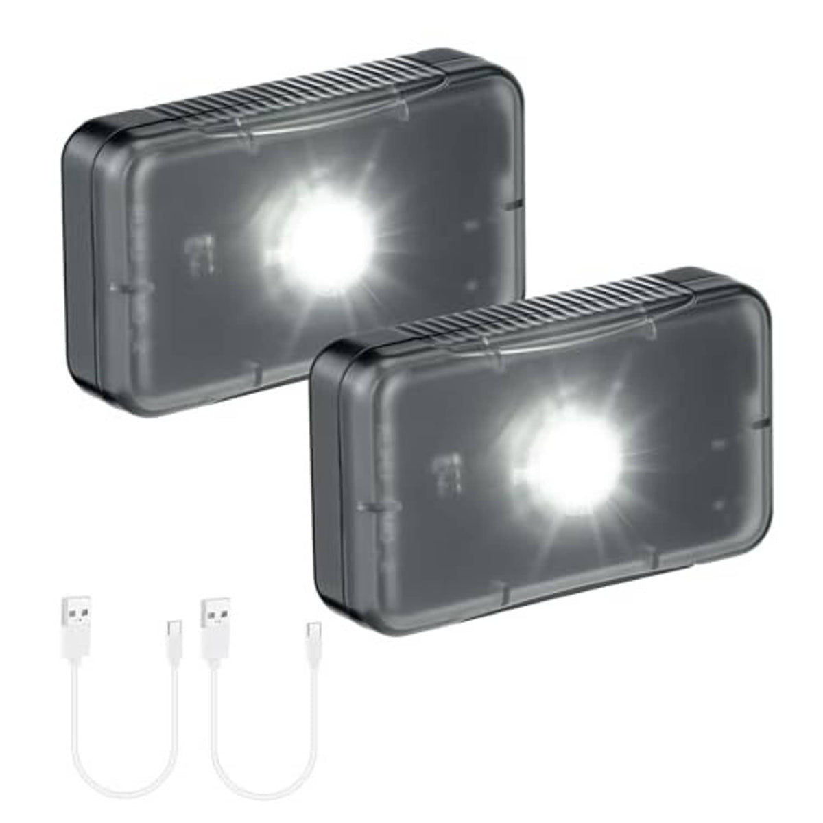 Two dark rectangular LED sensor lights with bright LEDs and charging cables