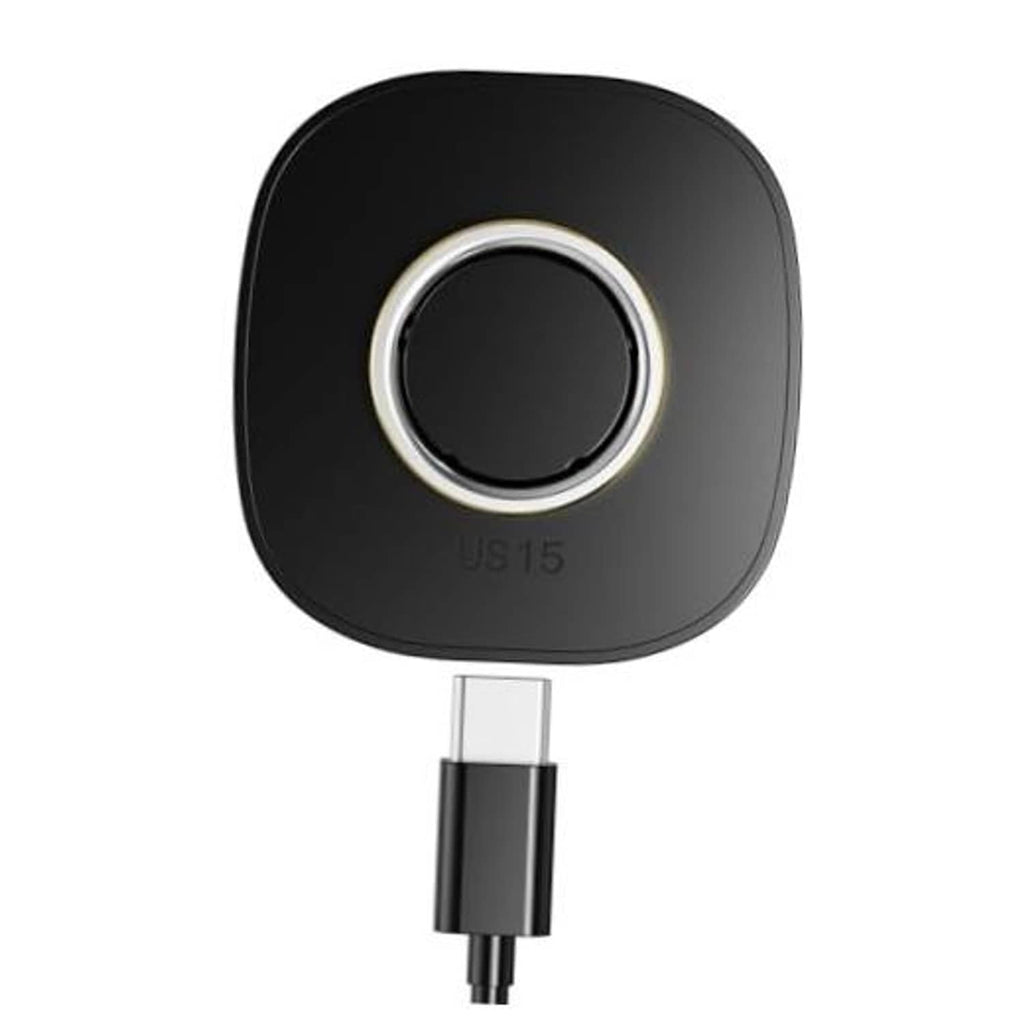 Black charging dock base with circular gold ring and connected USB-C cable