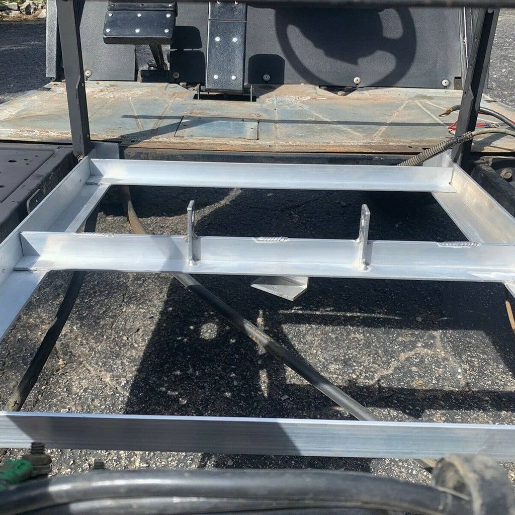 Aluminum battery tray base with divider rails inside the cart frame