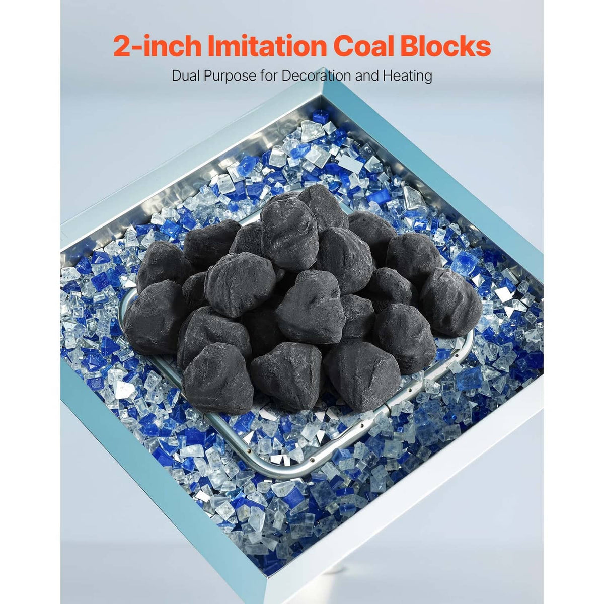 Black fire pit stones mound in a metal tray, for reusable flame display