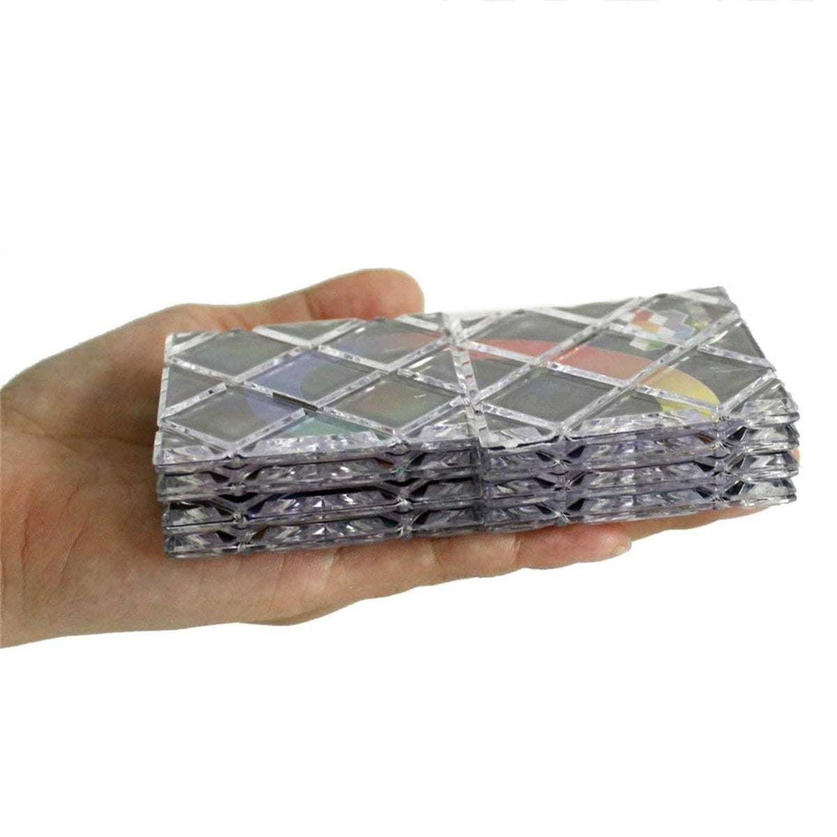Folded folding puzzle board, compact stacked black grid with colorful ring accents