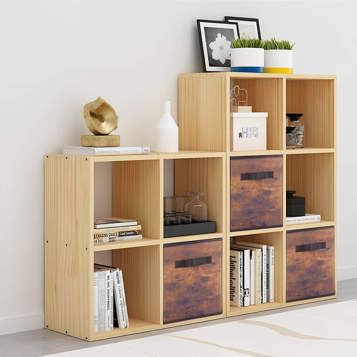 Wood-grain fabric storage cubbies with black pull handles and light wood frame.