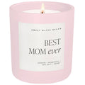 Pink soy jar scented candle with “Best Mom ever” label and centered flame