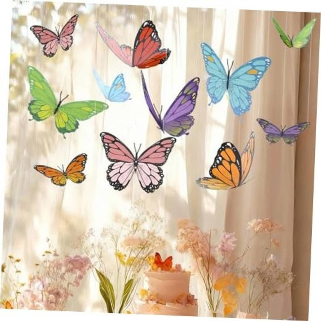 Colorful 3D paper butterflies with pink, green, blue wings on party backdrop