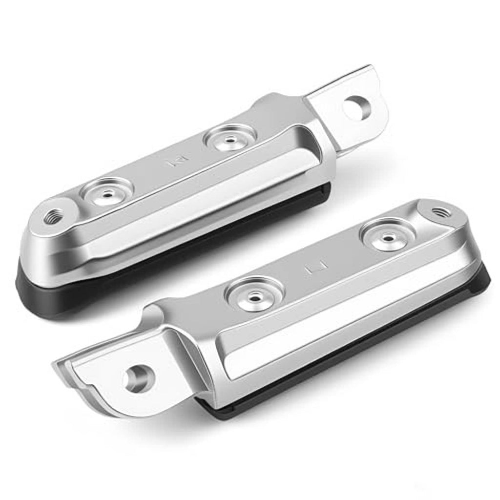 Motorcycle footrest bases: silver plates with black rubber inserts and mounting holes