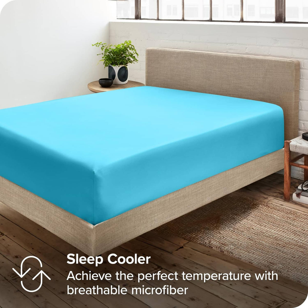 Aqua fitted microfiber sheet on bed mattress, clean fitted corner fit
