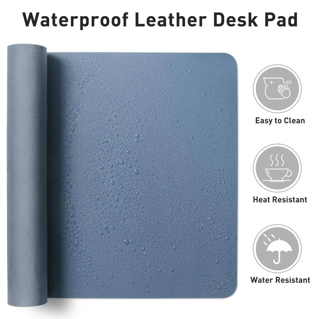 Water-resistant denim blue desk pad protector with rolled edge and water droplet texture